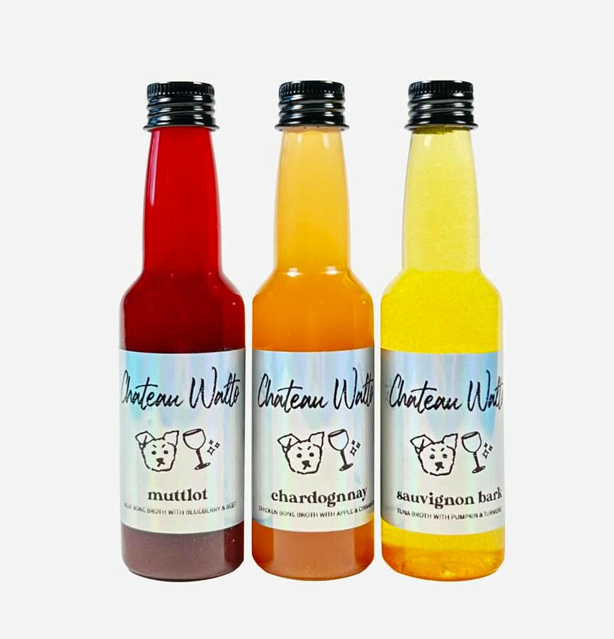 Chateau Walto pet-friendly wine kit with three flavors: Muttlot, Chardonnay, and Sauvignon Barb in colorful bottles.