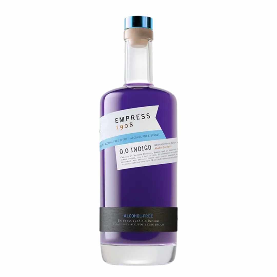 Bottle of purple gin with label reading Empress 1908 0.0 Ingdigo gin on a white background