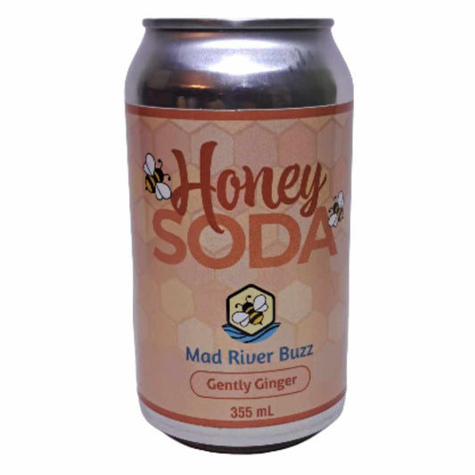 Can of Honey Soda with Mad River Buzz Gently Ginger on a white background