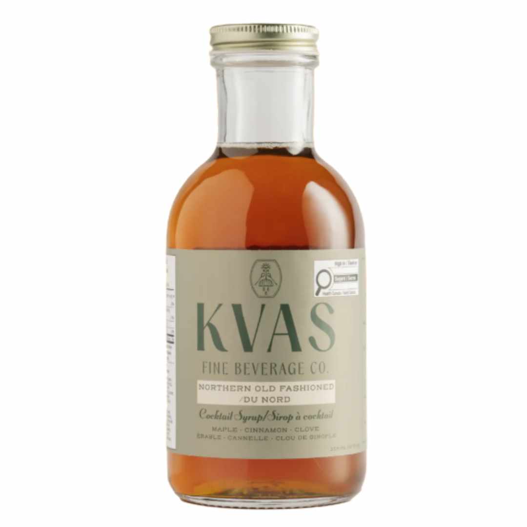 Bottle of KVAS Fine Beverage Co. Northern Old Fashioned Cocktail Syrup on a white background