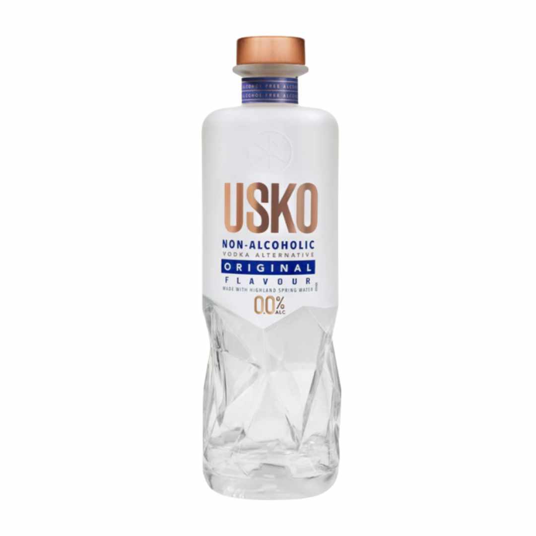 Clear bottle of USKO non-alcoholic vodka with a white label on a white background