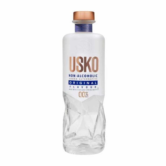 Clear bottle of USKO non-alcoholic vodka with a white label on a white background